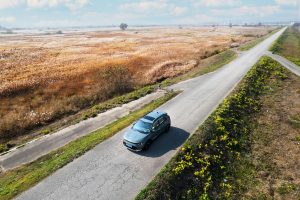 Car driving down a road 